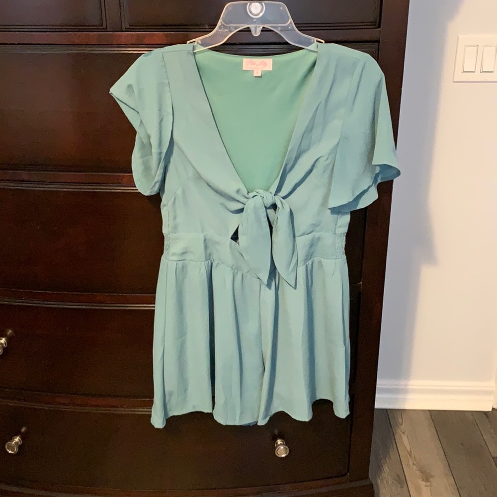 Small green romper.